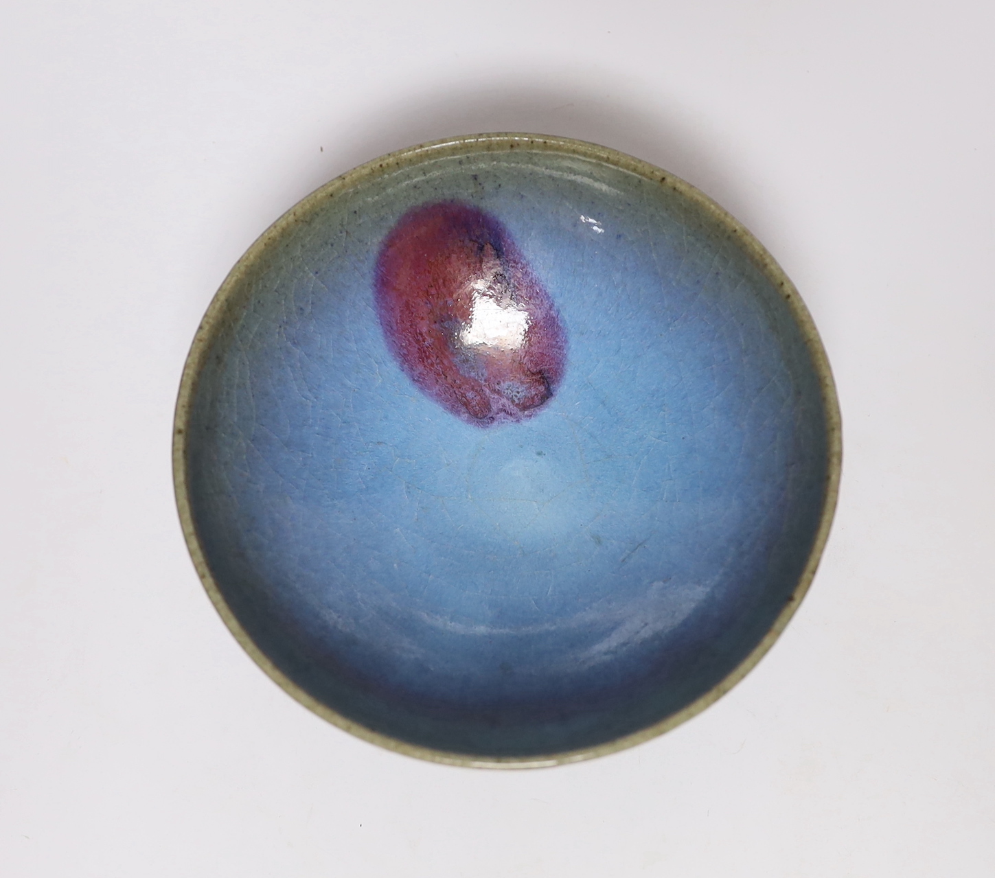 A Chinese Jun type pottery bowl, 15cm diameter